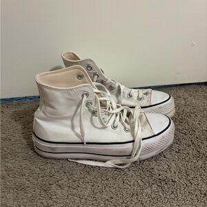 Well worn white converse